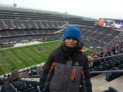 He's smiling because his team is playing the Bears...